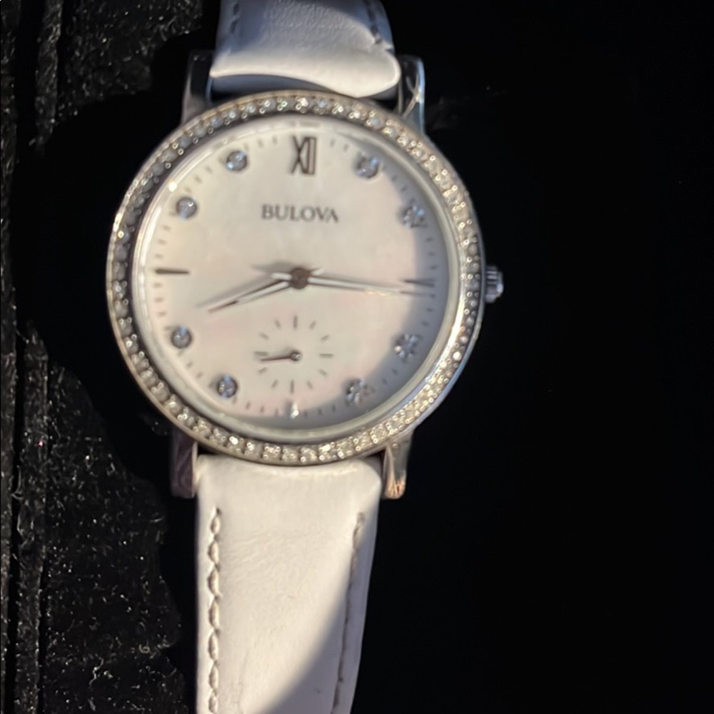 White Women’s Bulova Watch with crystals on face